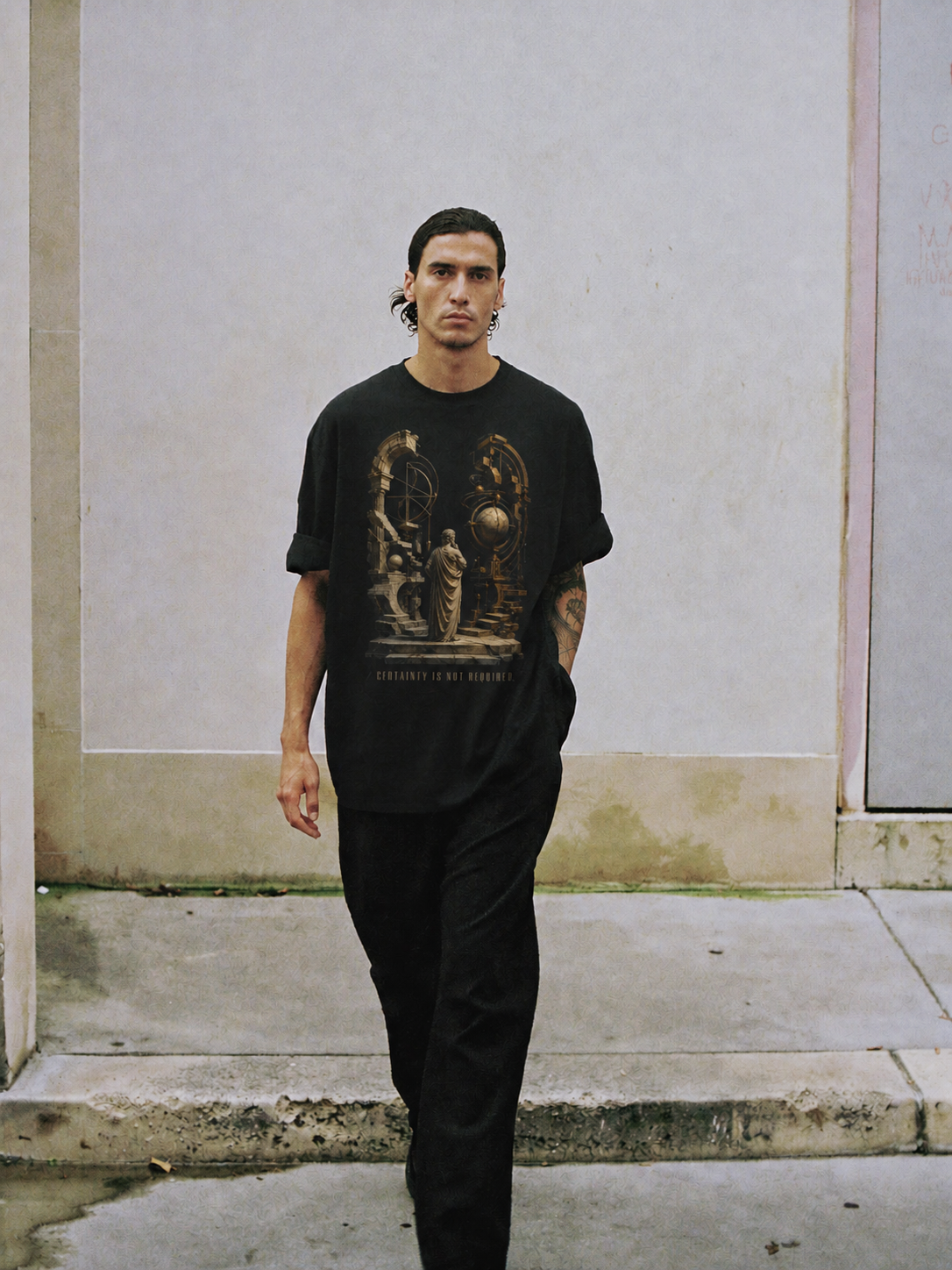 Arcesilaus Open Inquiry black T-shirt — male Athens lifestyle shot 01