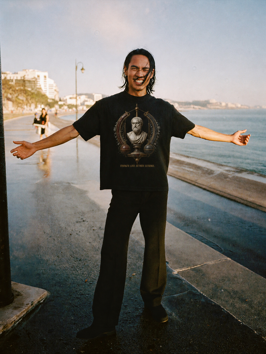 Aristotle Golden Mean black T-shirt — male Athens lifestyle shot 01