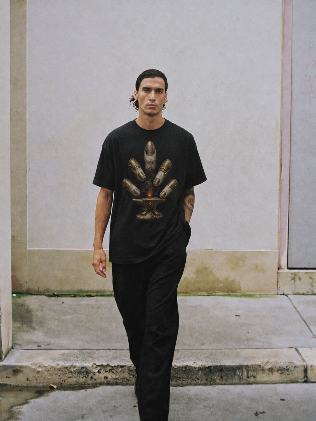 Cretan Dactyl Hand Forge black T-shirt — male Athens lifestyle shot 01