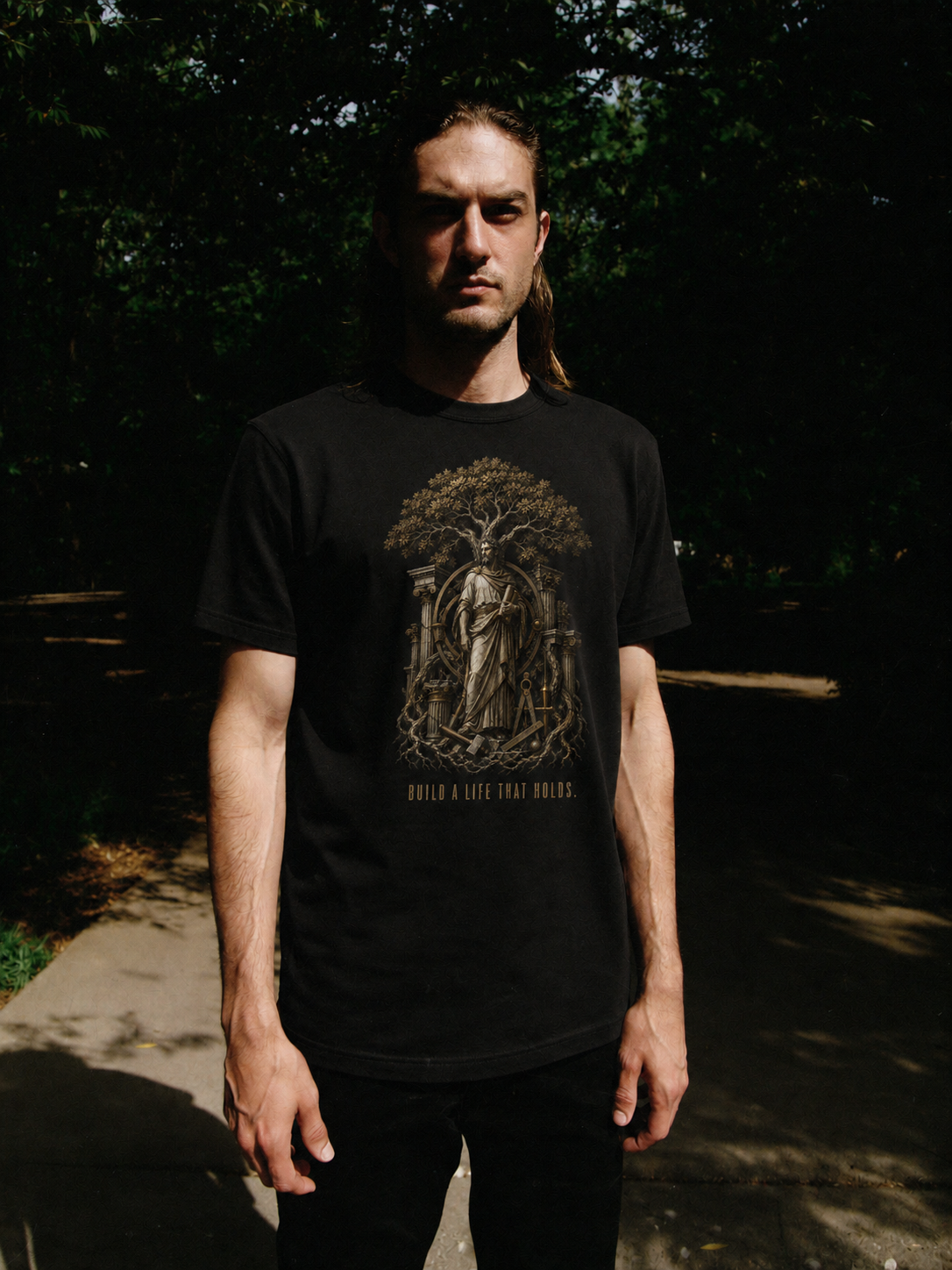 Eudaimonia Human Flourishing black T-shirt — male Athens lifestyle shot 01