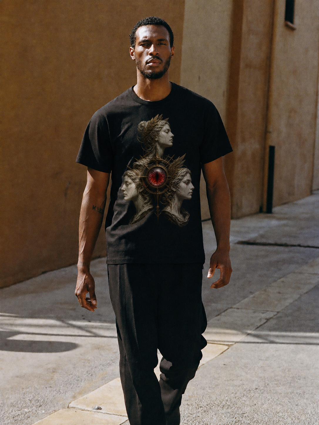 Graeae Shared Eye black T-shirt — male Athens lifestyle shot 01