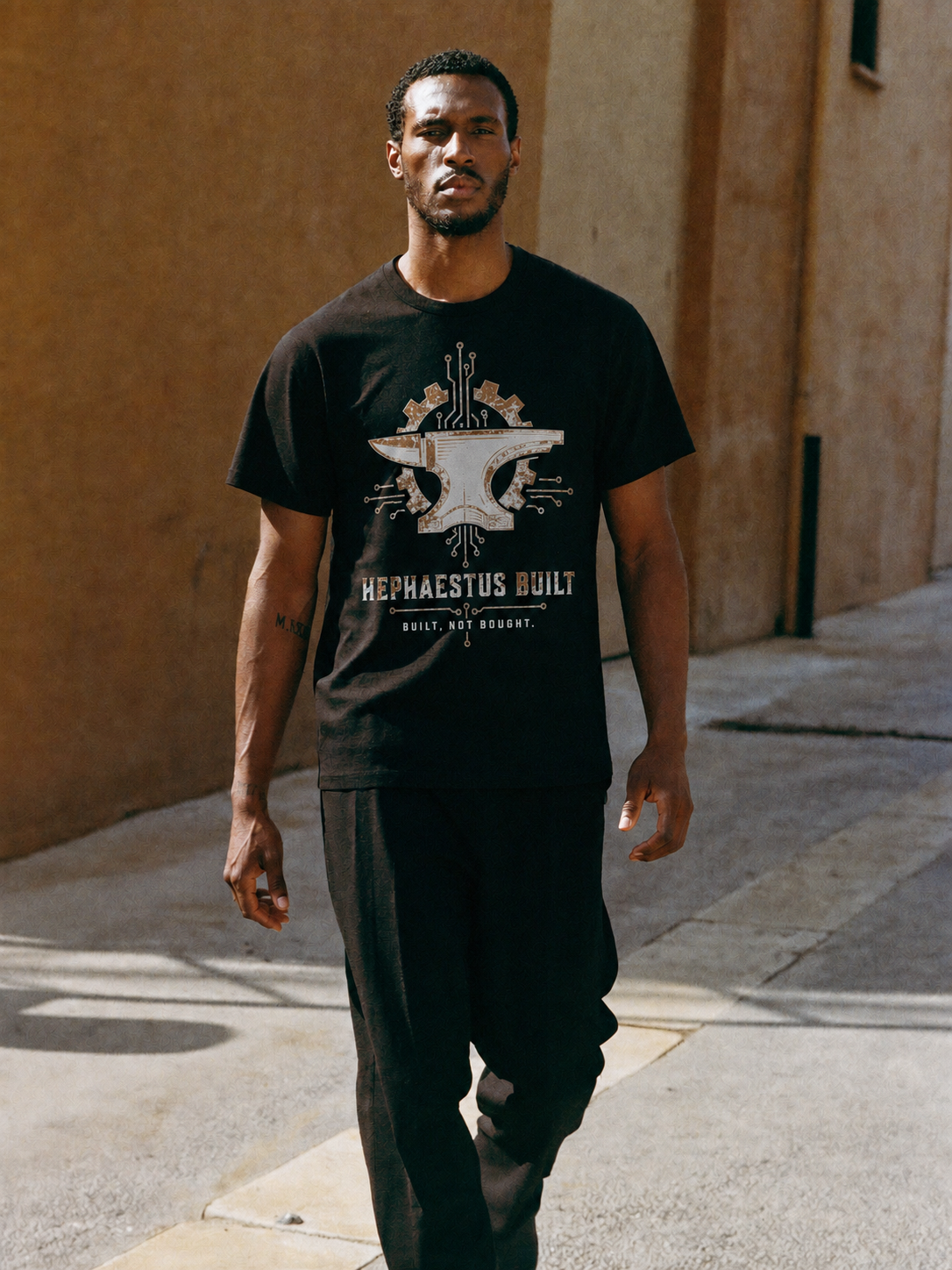 Hephaestus Built black T-shirt — male Athens lifestyle view 1