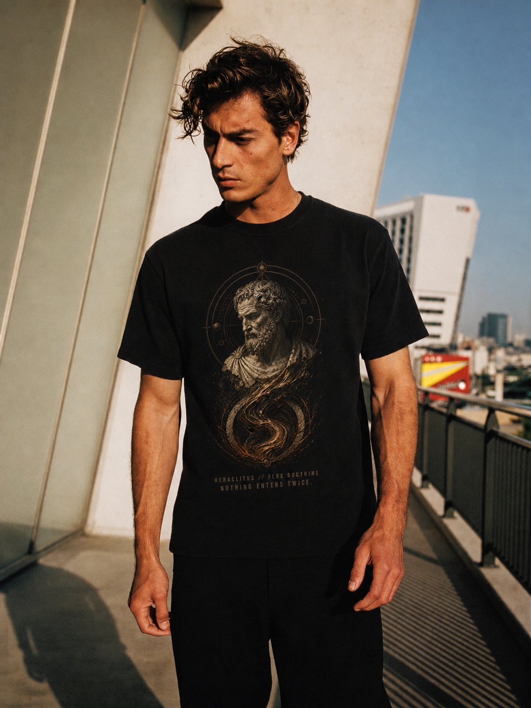 Heraclitus Flux Doctrine black T-shirt — male Athens lifestyle shot 01
