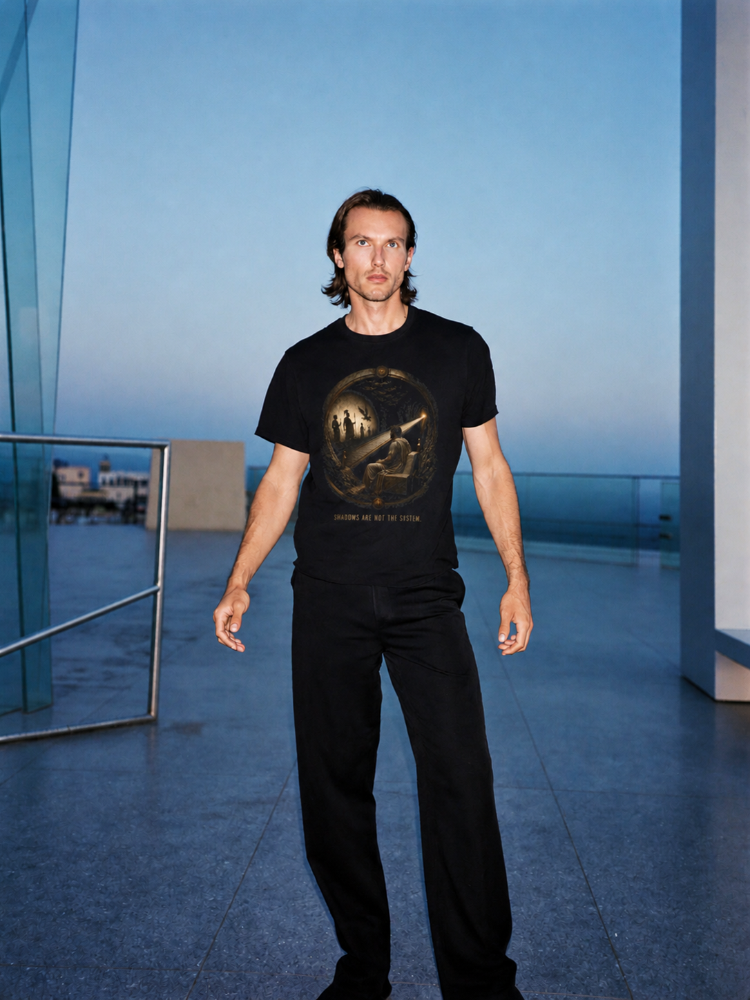 Plato Cave Protocol black T-shirt — male Athens lifestyle shot 01