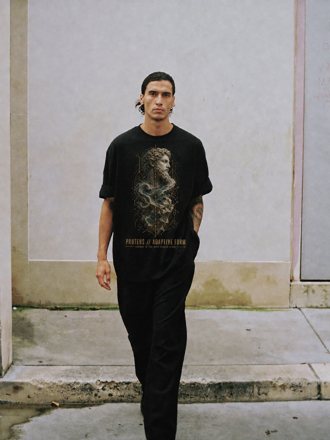 Proteus Adaptive Form black T-shirt — male Athens lifestyle shot 01