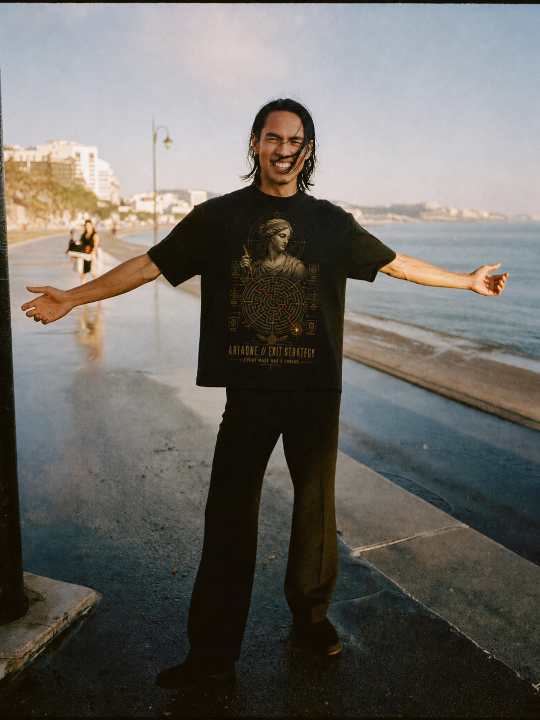 Ariadne Exit Strategy black T-shirt — male Athens lifestyle shot 02