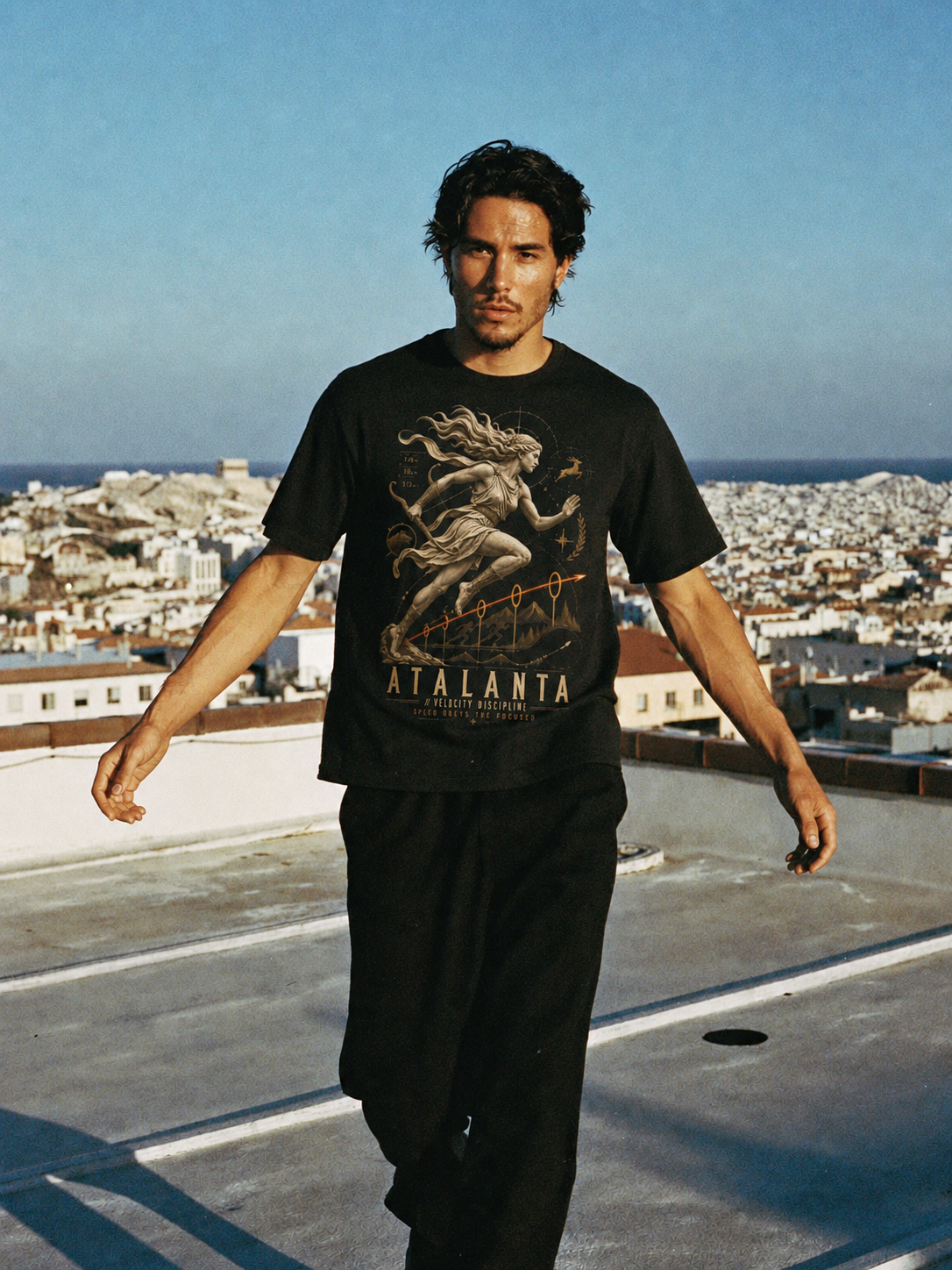 Atalanta Velocity Discipline black T-shirt — male Athens lifestyle shot 02