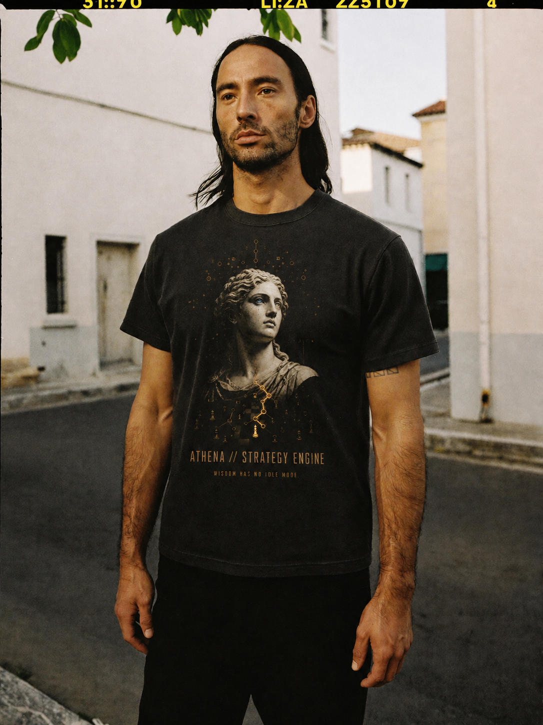 Athena Strategy Engine black T-shirt — male Athens lifestyle view 2