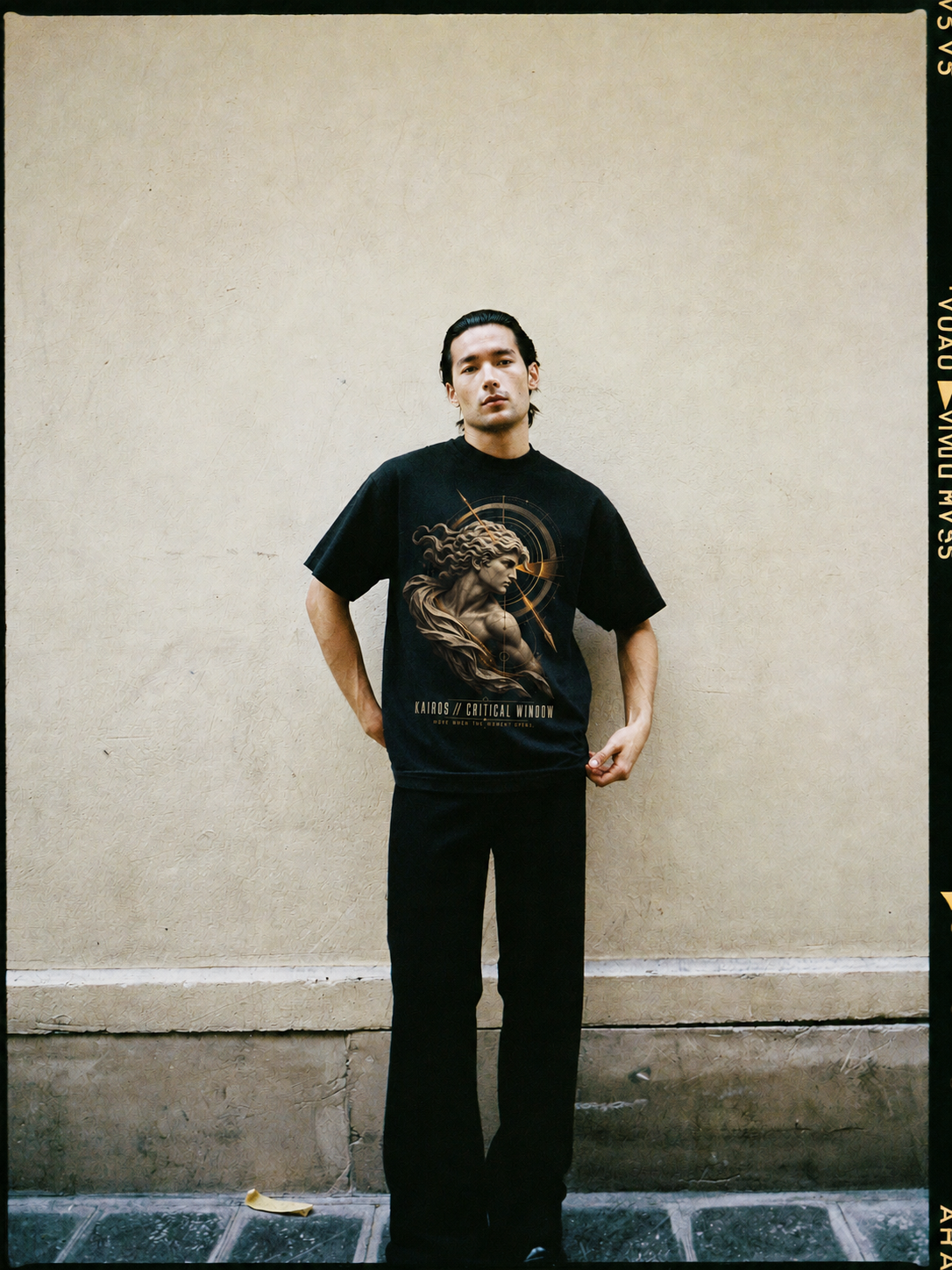 Kairos Critical Window black T-shirt — male Athens lifestyle shot 02