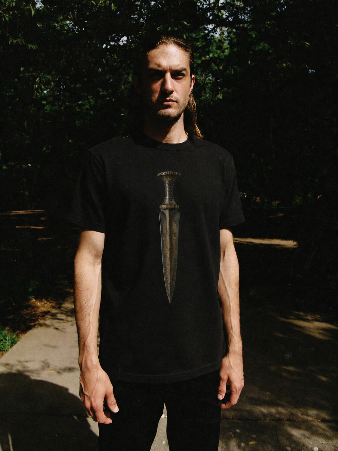 Mycenaean Gold-Weave Blade T-Shirt — male lifestyle scene 2 in Athens