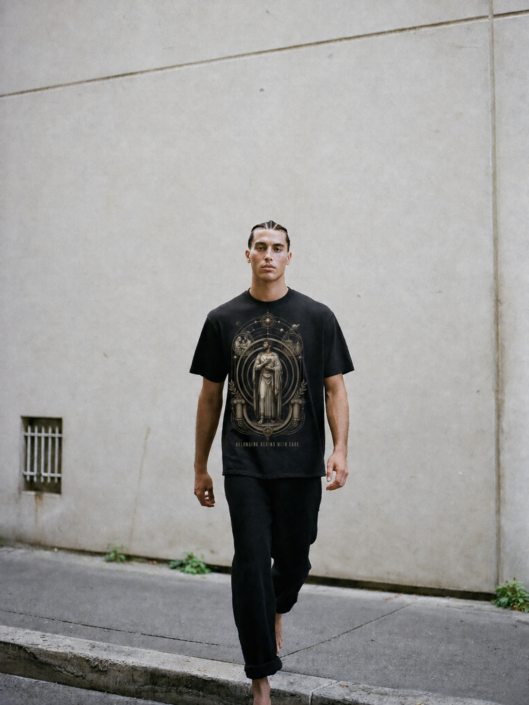 Oikeiosis Expanding Circle black T-shirt — male Athens lifestyle shot 02