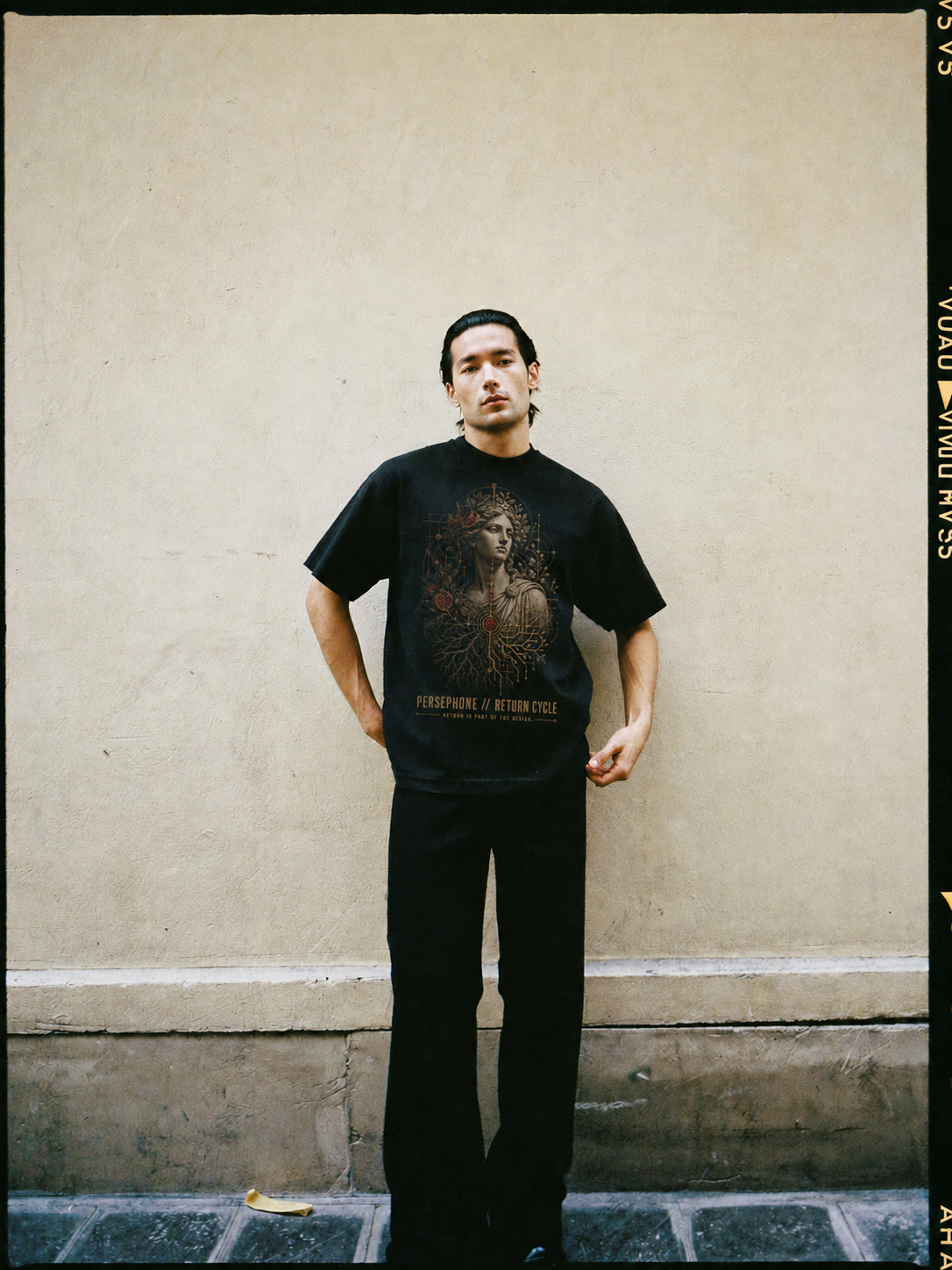 Persephone Return Cycle black T-shirt — male Athens lifestyle shot 02