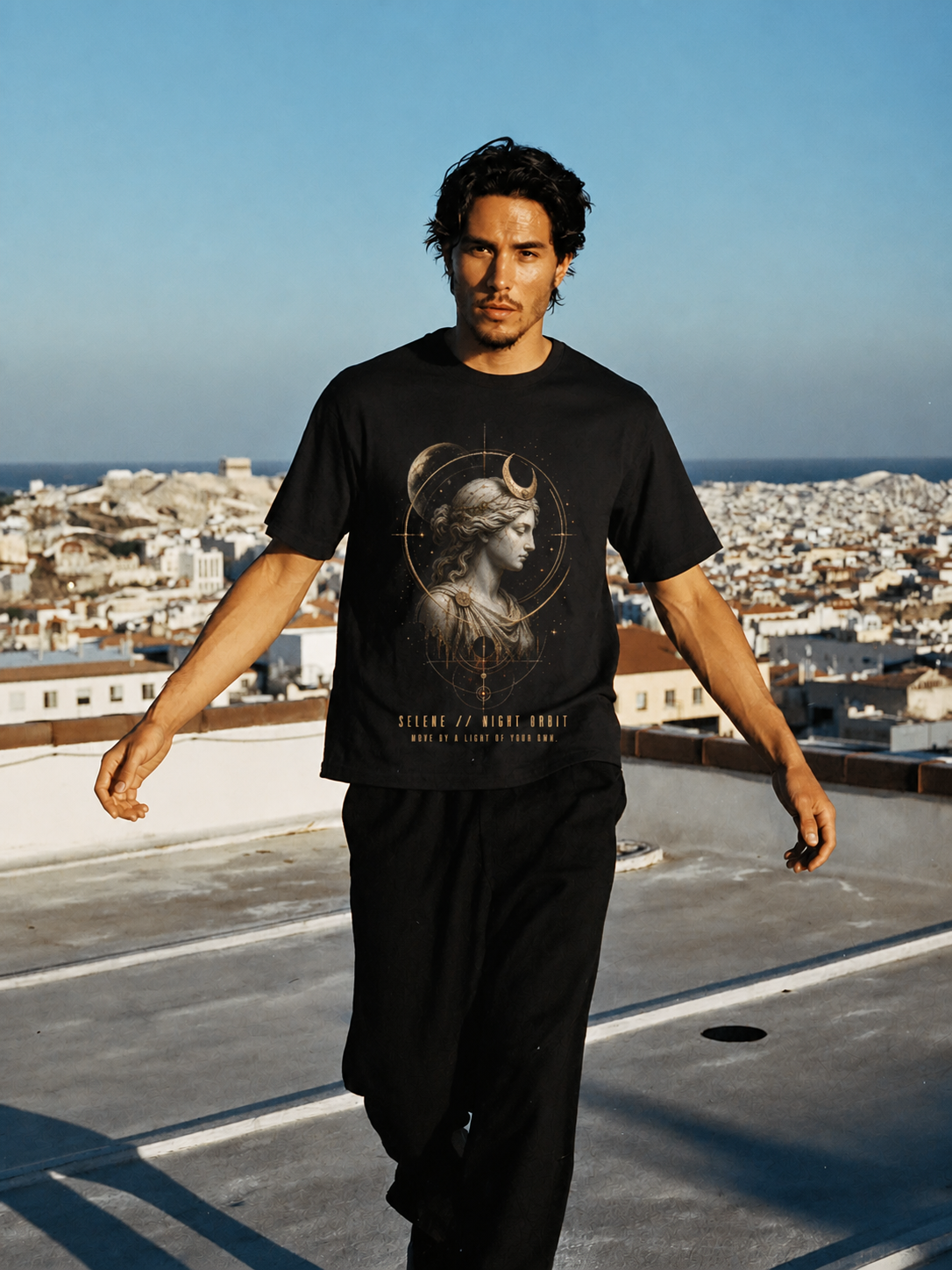 Selene Night Orbit black T-shirt — male Athens lifestyle shot 02