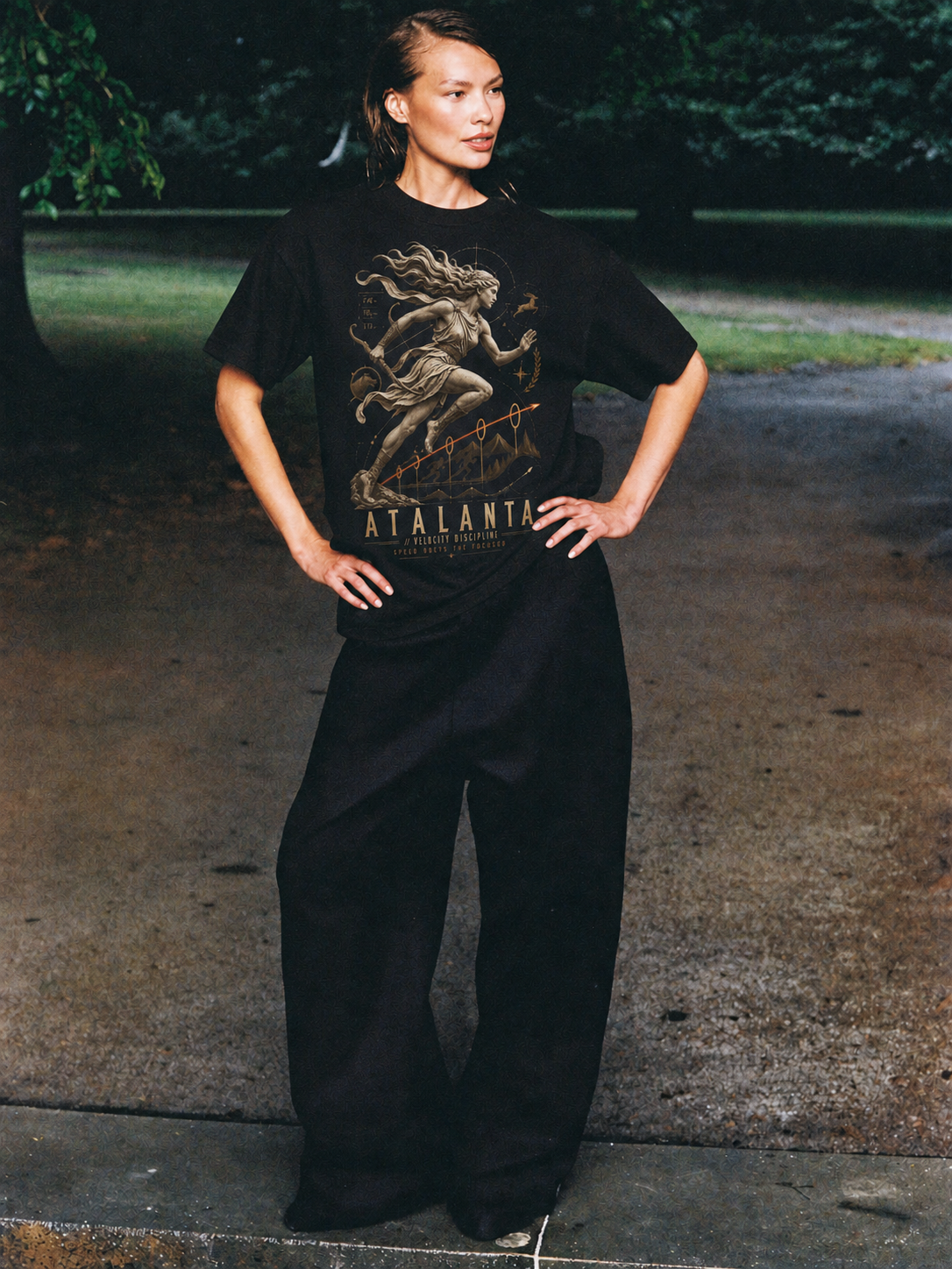 Atalanta Velocity Discipline black T-shirt — female Athens lifestyle shot 03