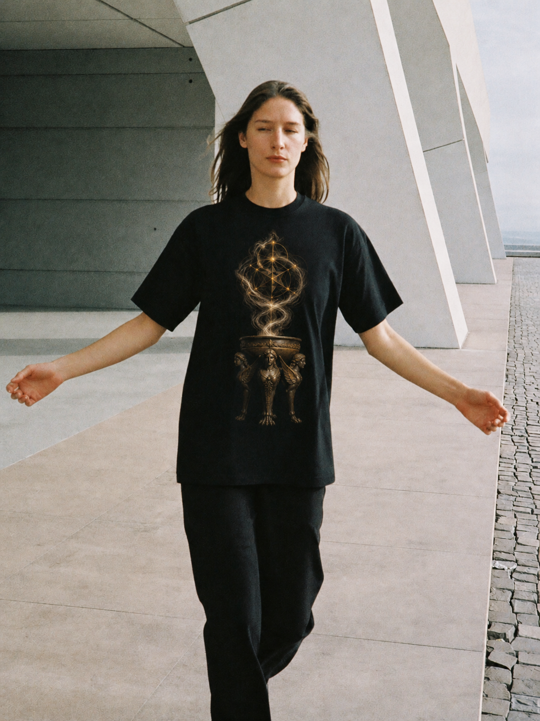 Delphic Tripod black T-shirt — female Athens lifestyle shot 03