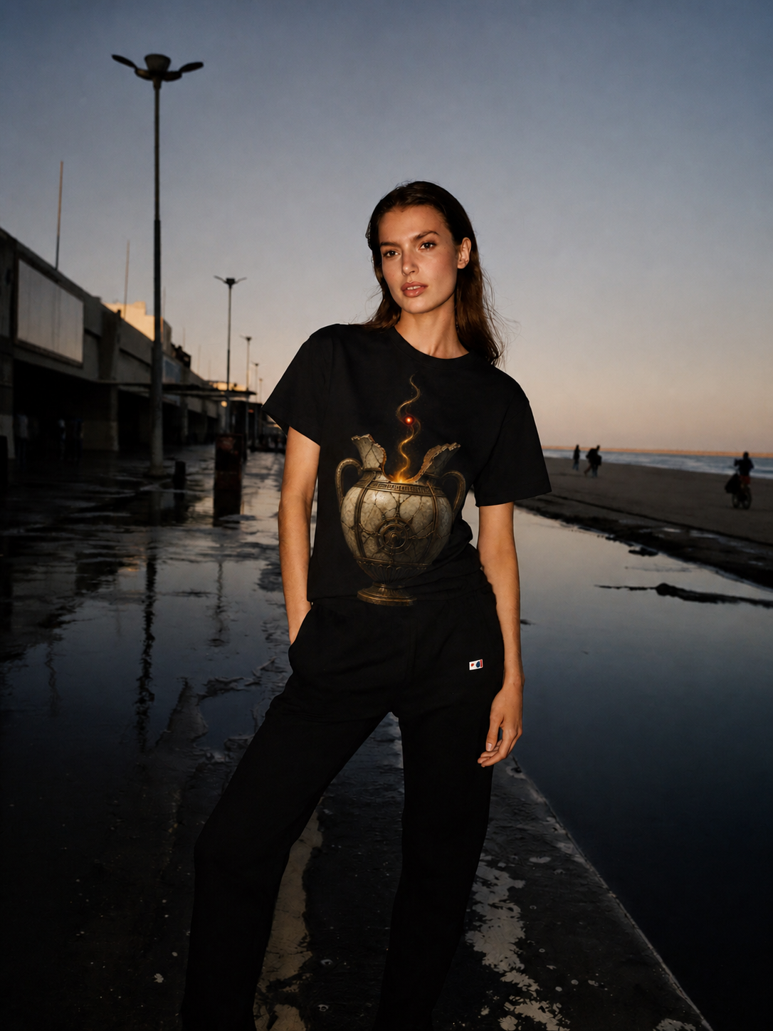 Elpis Last Ember black T-shirt — female Athens lifestyle shot 03