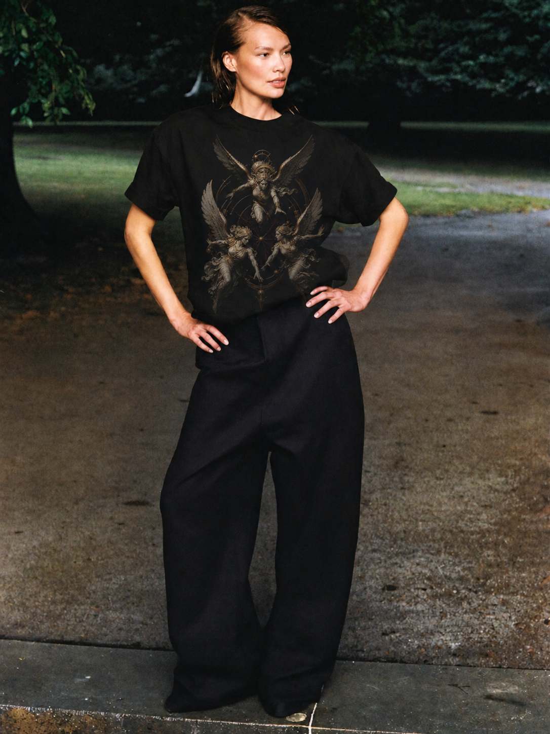 Erinyes Triple Pursuit black T-shirt — female Athens lifestyle shot 03