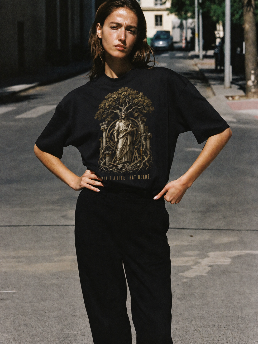Eudaimonia Human Flourishing black T-shirt — female Athens lifestyle shot 03