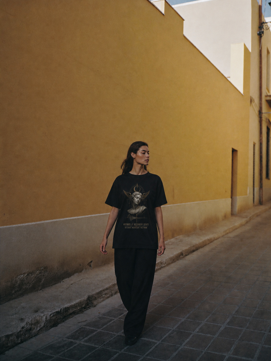 Hypnos Recovery State black T-shirt — female Athens lifestyle shot 03