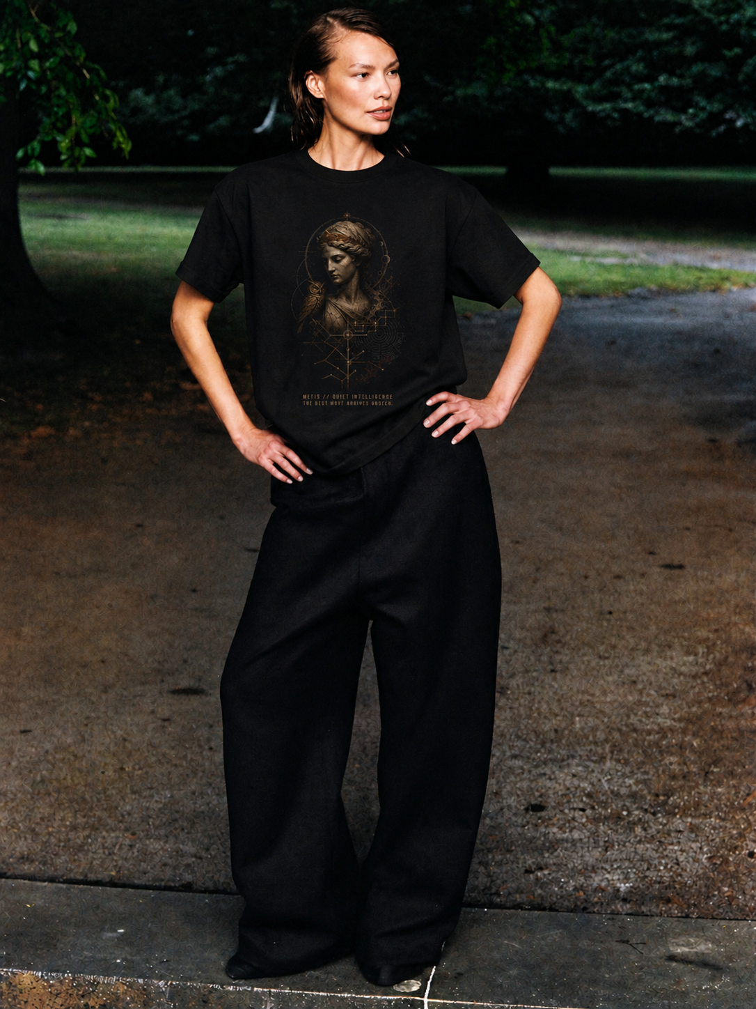 Metis Quiet Intelligence black T-shirt — female Athens lifestyle shot 03
