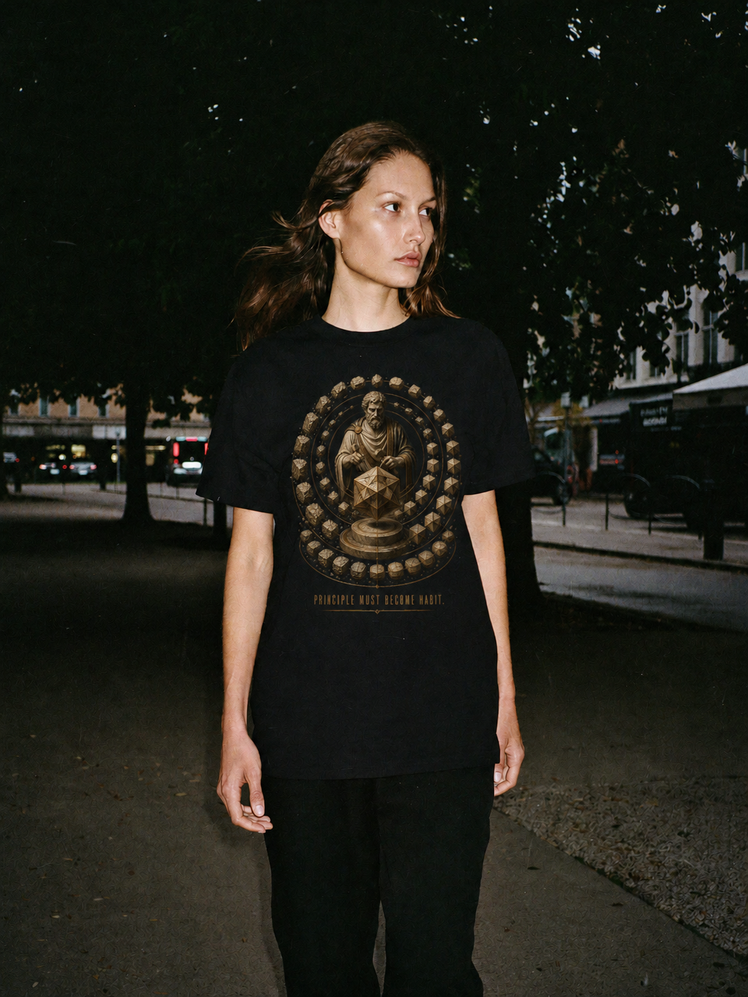 Musonius Practice Discipline black T-shirt — female Athens lifestyle shot 03