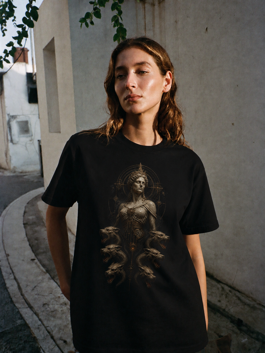 Scylla Below the Strait black T-shirt — female Athens lifestyle shot 03
