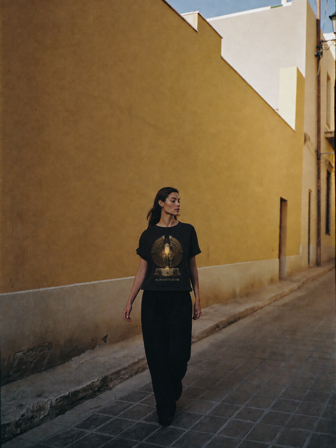 Aporia Productive Doubt black T-shirt — female Athens lifestyle shot 04