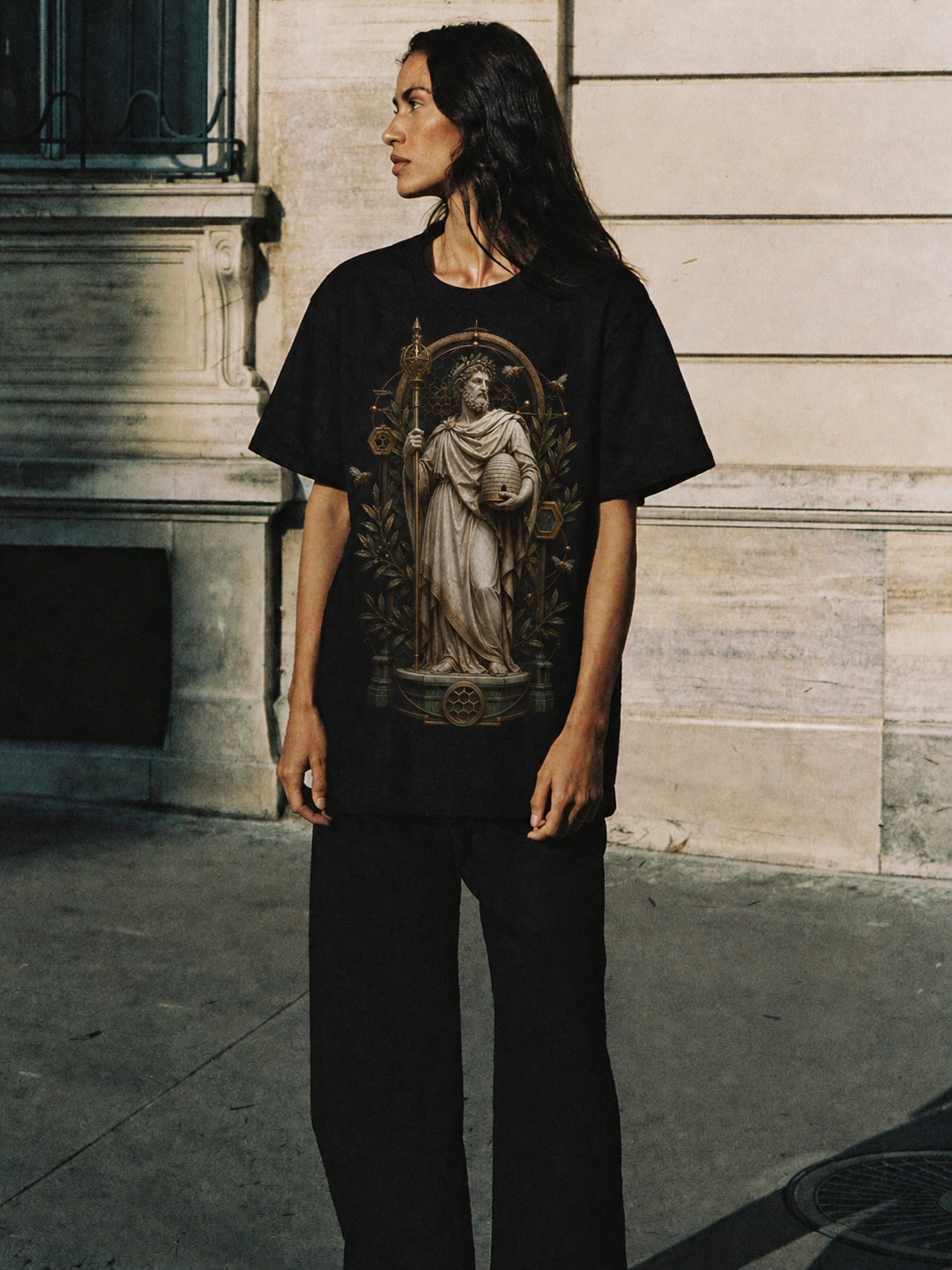 Aristaeus Hive Order black T-shirt — female Athens lifestyle shot 04