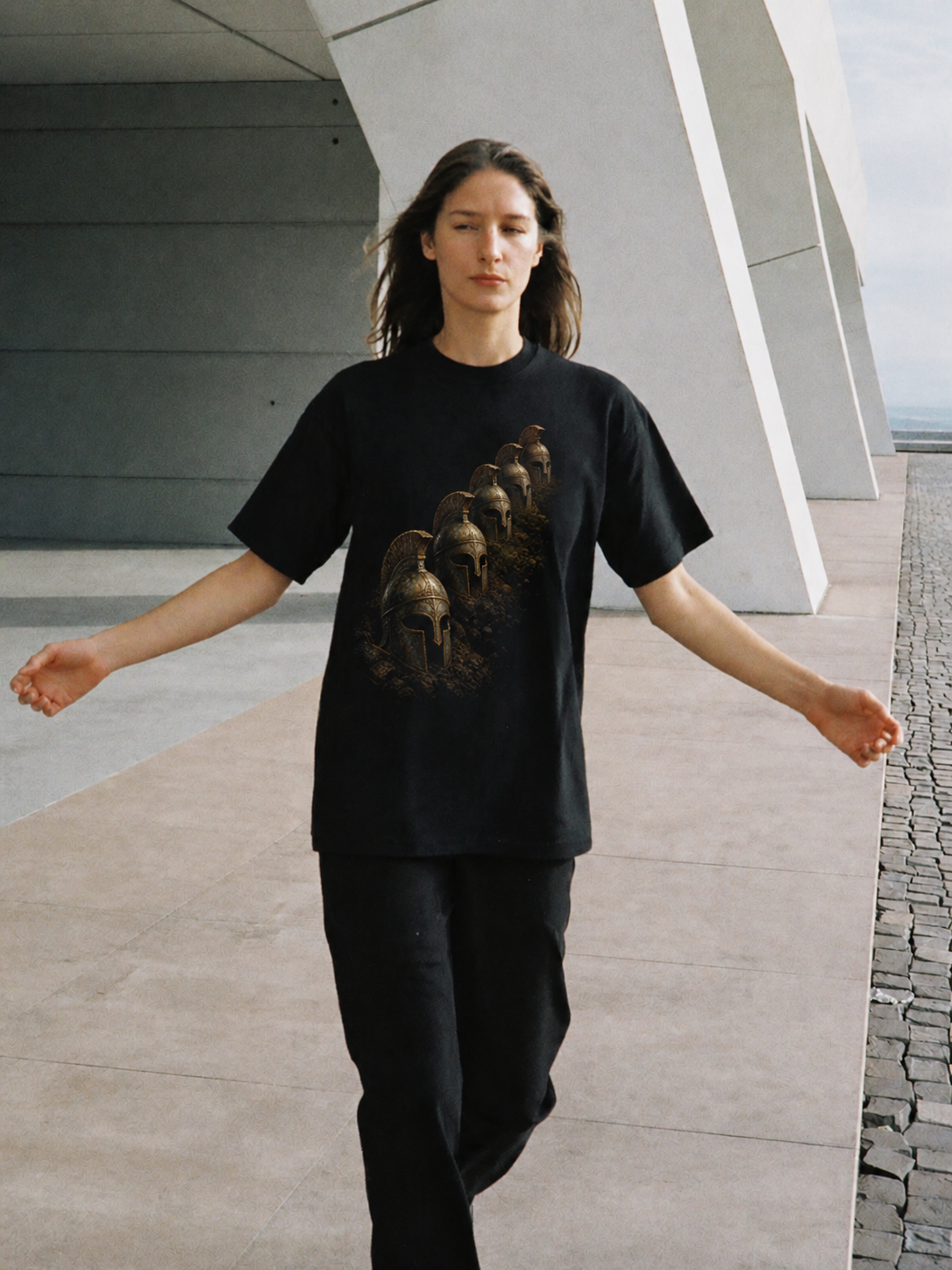 Cadmus Sown Warriors black T-shirt — female Athens lifestyle shot 04