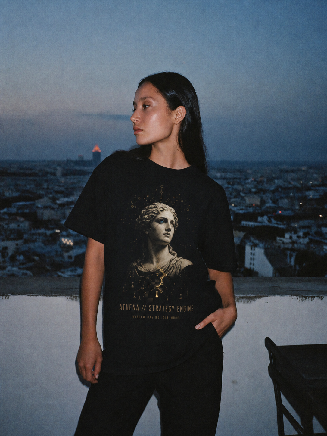 Athena Strategy Engine black T-shirt — female Athens lifestyle view 2