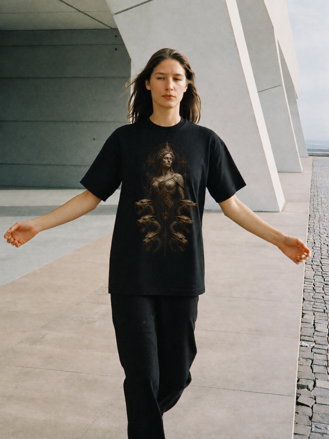 Scylla Below the Strait black T-shirt — female Athens lifestyle shot 04