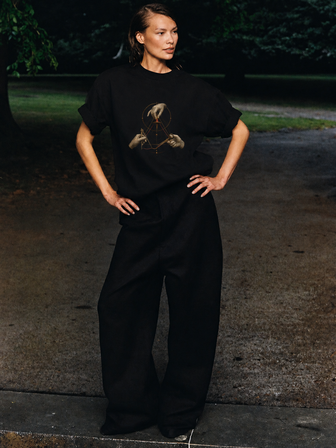 The Three Threads black T-shirt — female Athens lifestyle shot 04