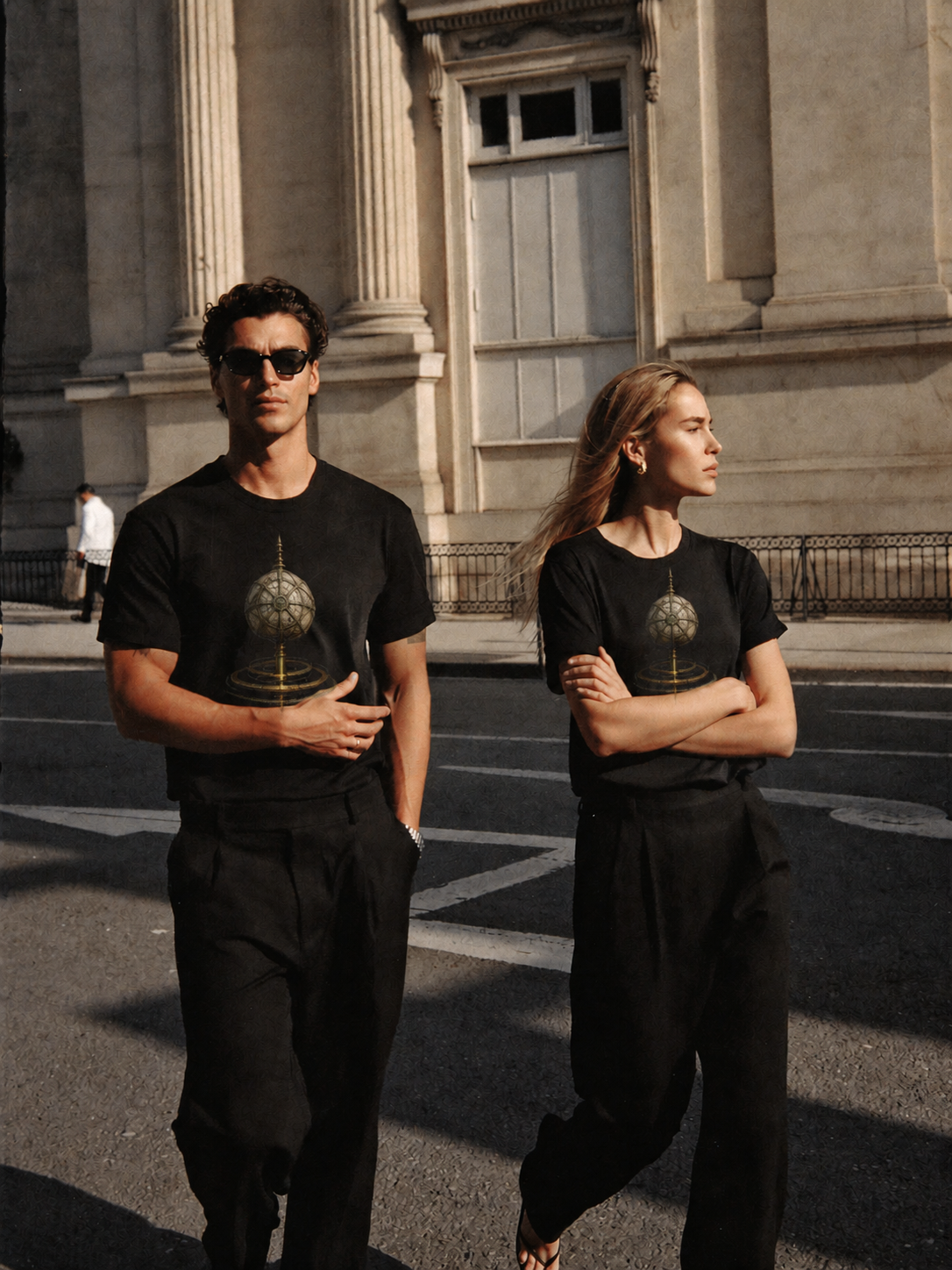 Omphalos World Axis black T-shirt — couple Athens lifestyle shot 05