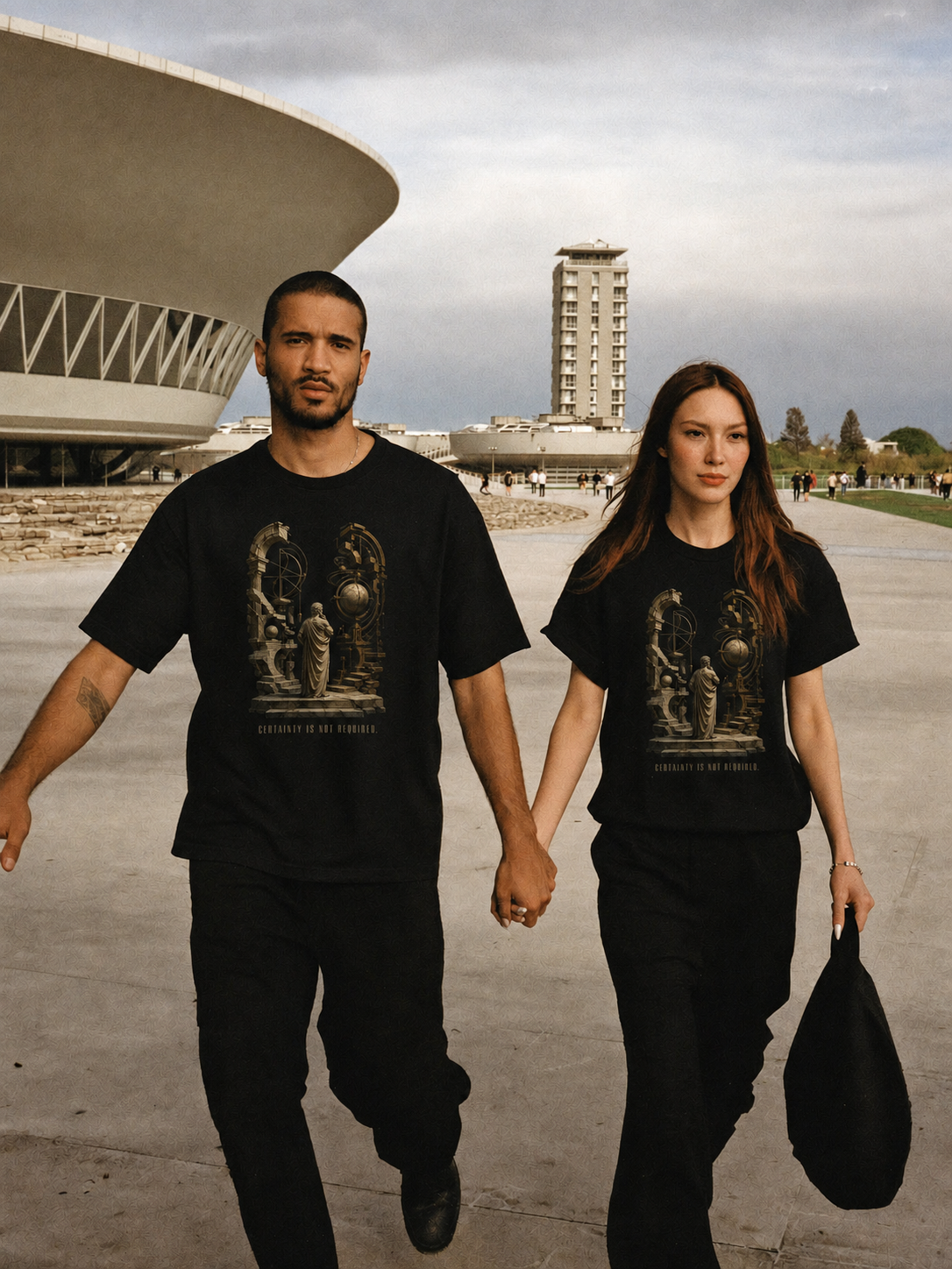 Arcesilaus Open Inquiry black T-shirt — couple Athens lifestyle shot 06