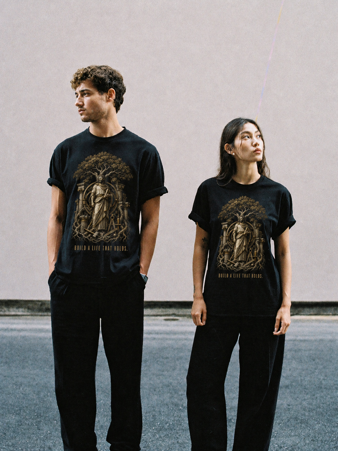Eudaimonia Human Flourishing black T-shirt — couple Athens lifestyle shot 06