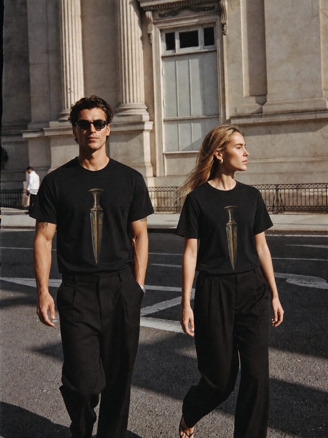 Mycenaean Gold-Weave Blade T-Shirt — couple lifestyle scene 2 in Athens